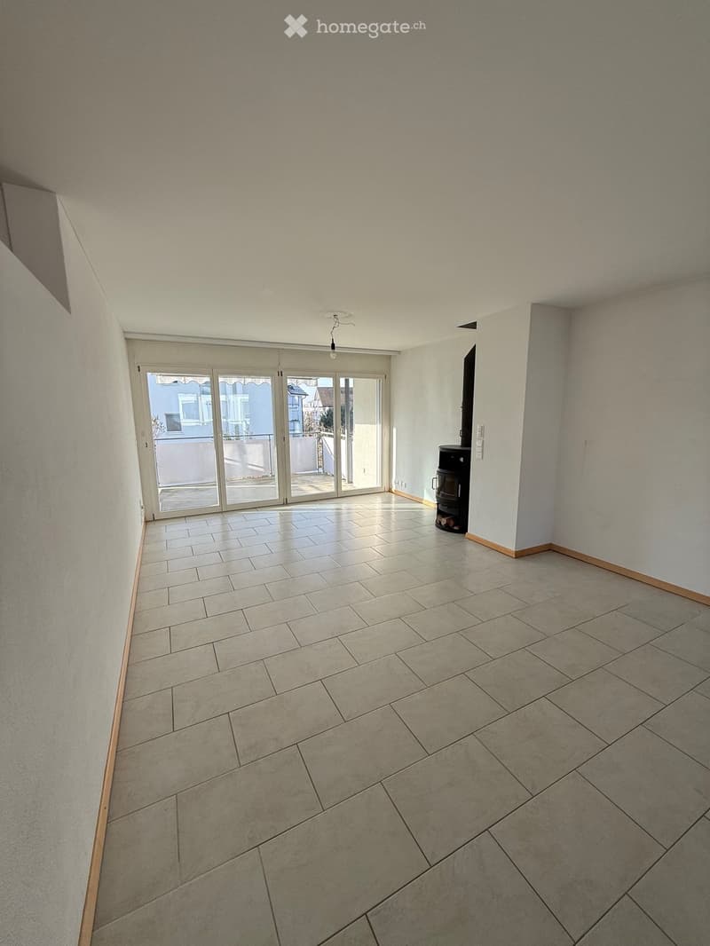 empty room, large windows, tile floor, fireplace, balcony