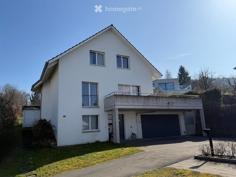 2 story house, white exterior, garage, balcony, windows, driveway