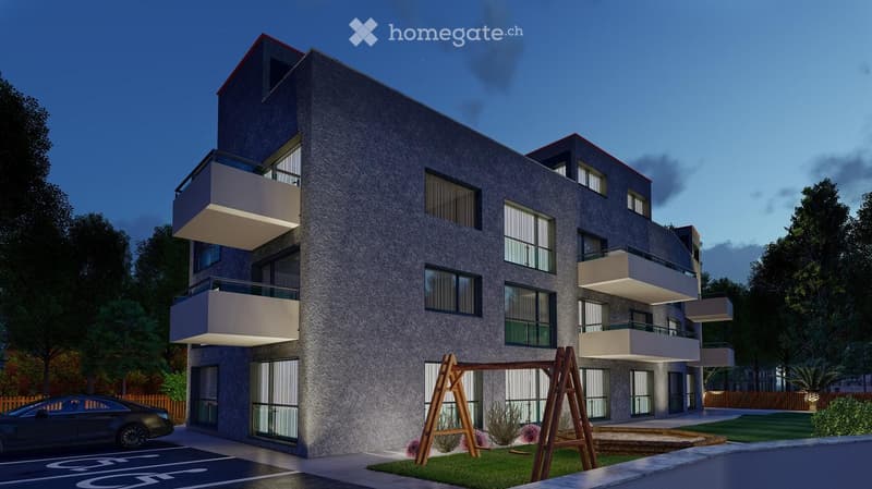 Modern three-story residential building with balconies, large windows, and a playground in the foreground.