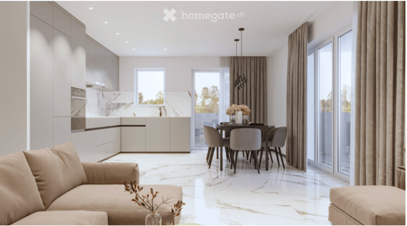 Modern, open-concept living and dining area with a beige sofa, coffee table, dining table with chairs, and a sleek kitchen with white cabinets and stainless steel appliances.