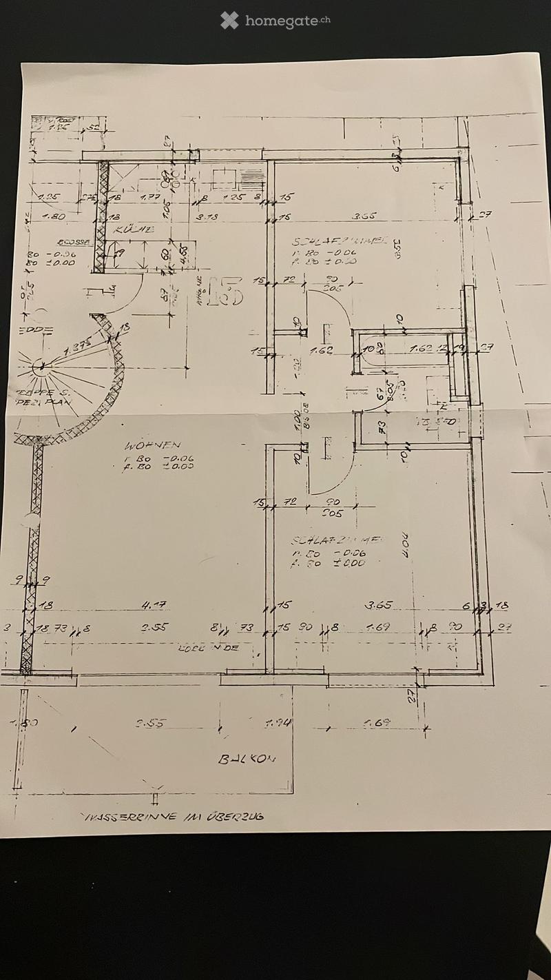 Hand-drawn floor plan of a residential space, showing multiple rooms including a living area, kitchen, bedrooms, and bathrooms with labeled dimensions and annotations.