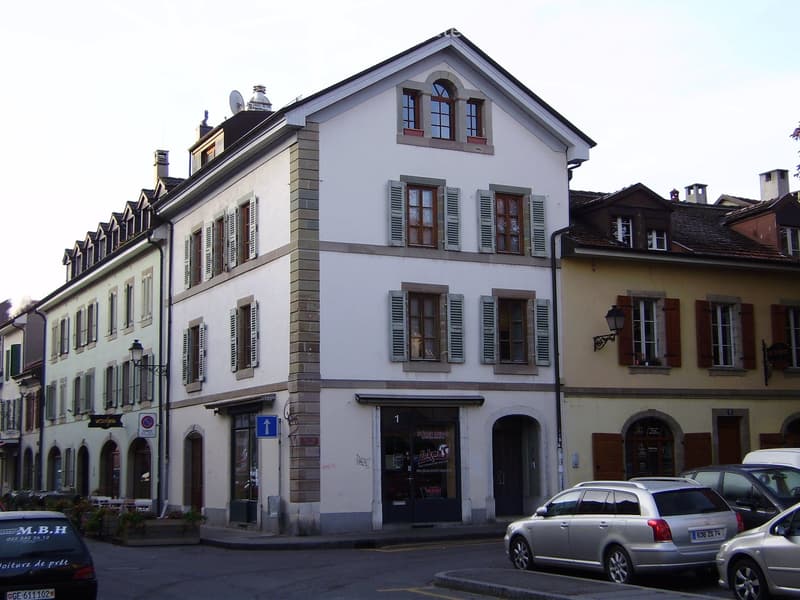 3 story house, white facade, green shutters, terrace, street-side entrance