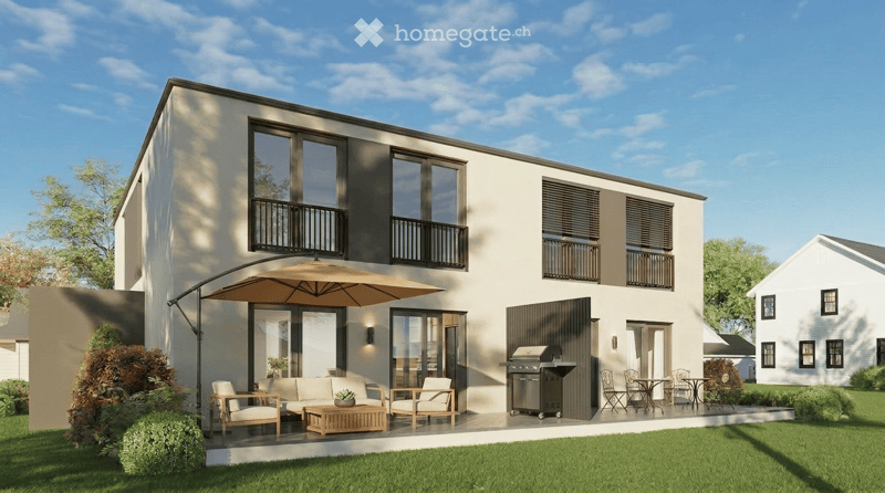Modern two-story house with white exterior, large windows, balconies, patio with outdoor furniture, grill, and umbrella.