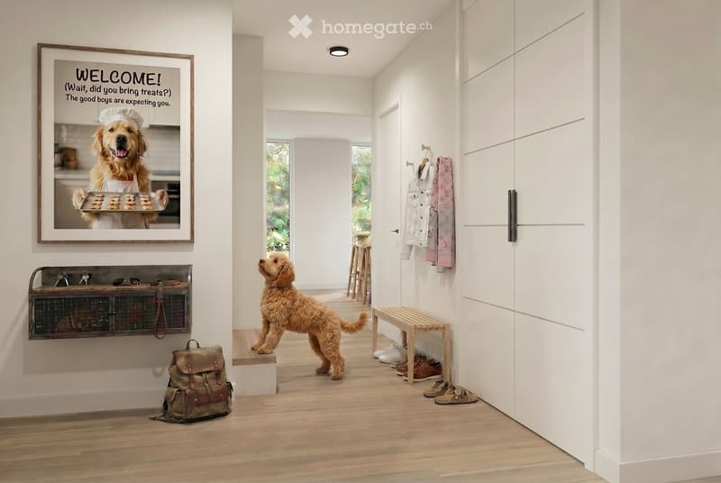 Bright hallway with wooden flooring, white walls, a small bench, a dog, a backpack, and a framed picture of a dog in a chef's hat.