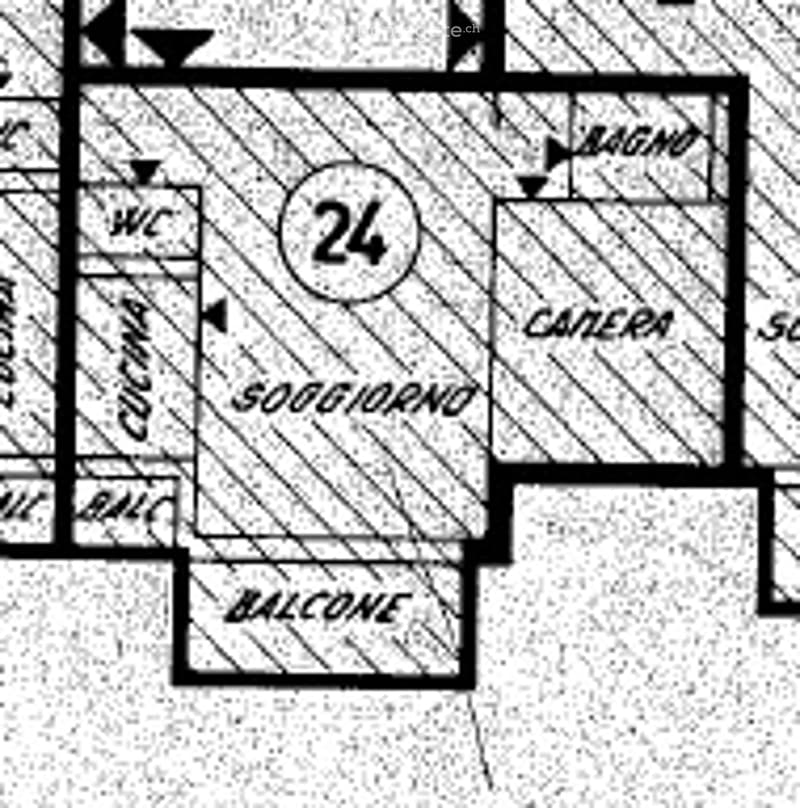 Floor plan of a residential space showing a living room, dining area, bedroom, and balcony.