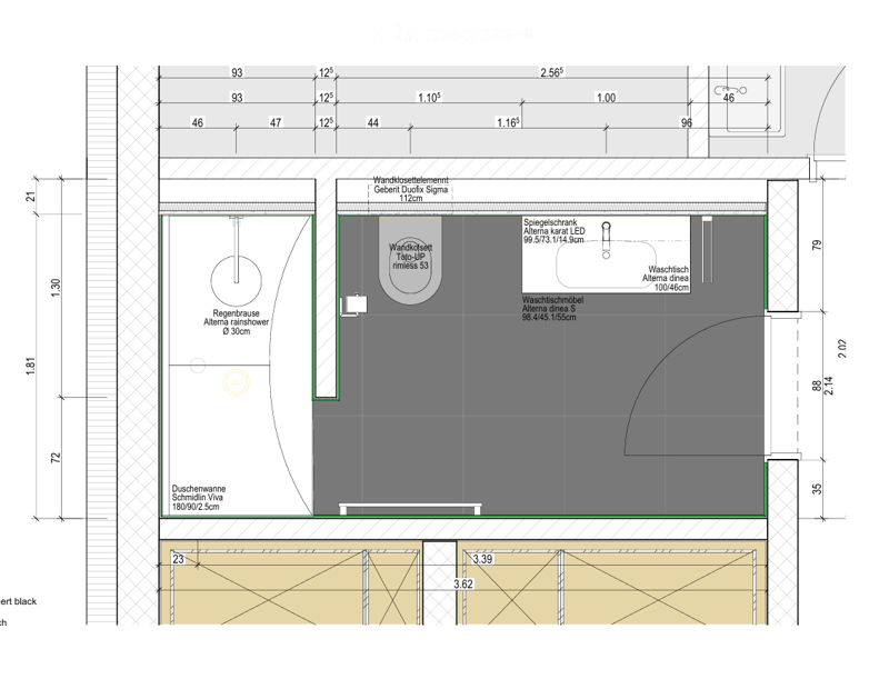 Floor plan of a bathroom showing a shower area, toilet, sink, and washing machine. Includes measurements and labels for fixtures.