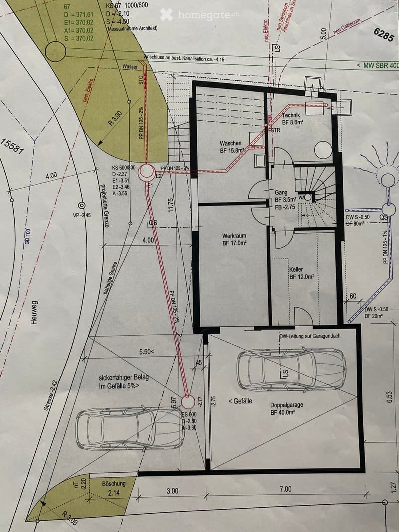 Floor plan showing a building layout with labeled rooms including a wash area, workshop, cellar, and double garage. Dimensions and measurements are indicated.