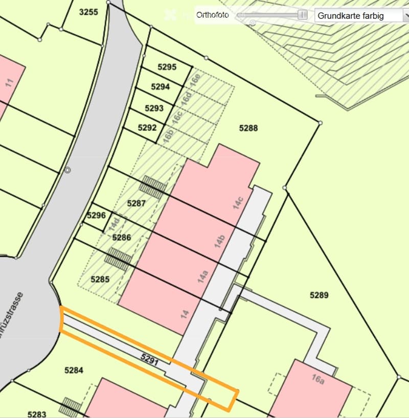 Topographic map showing property boundaries and parcel numbers, with highlighted area in orange.