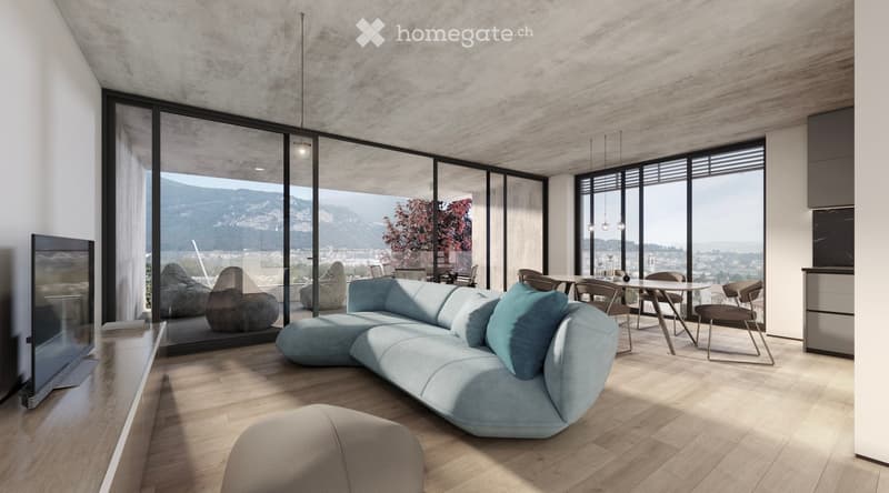 Modern living room with large windows offering a scenic mountain view, featuring a light blue sectional sofa, ottoman, dining table with chairs, and a television on a stand.