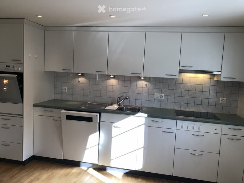 modern kitchen with white cabinets, granite countertop, oven, dishwasher, gas stove, and sink