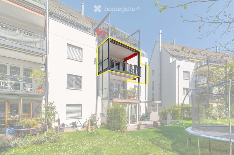 A multi-story residential building with balconies, surrounded by a well-maintained garden featuring a trampoline, potted plants, and a clear blue sky.