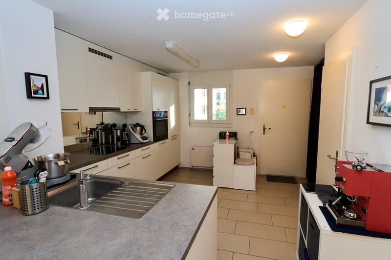 {"type": "Kitchen", "objects": ["sink", "faucet", "coffee maker", "oven", "cabinets", "framed picture", "faucet", "framed picture", "cupboard", "faucet", "oven", "faucet", "faucet", "faucet", "faucet", "faucet", "faucet", "faucet", "faucet", "faucet", "fa