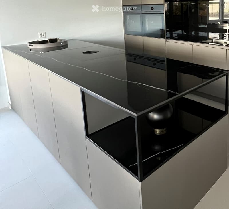 kitchen, modern kitchen island, black marble countertop, stainless steel frame, built-in oven, power outlet, shiny floor