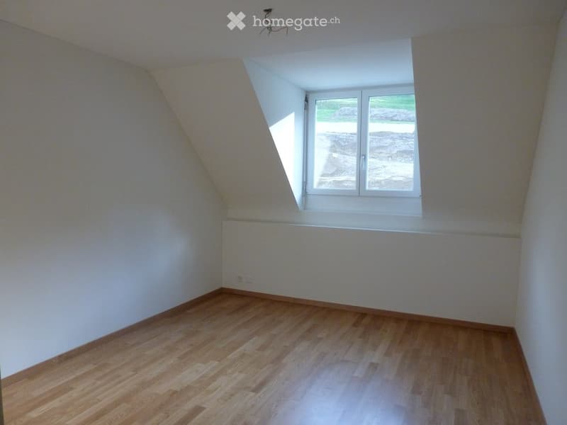 empty room, wooden floor, white walls, window with outdoor view