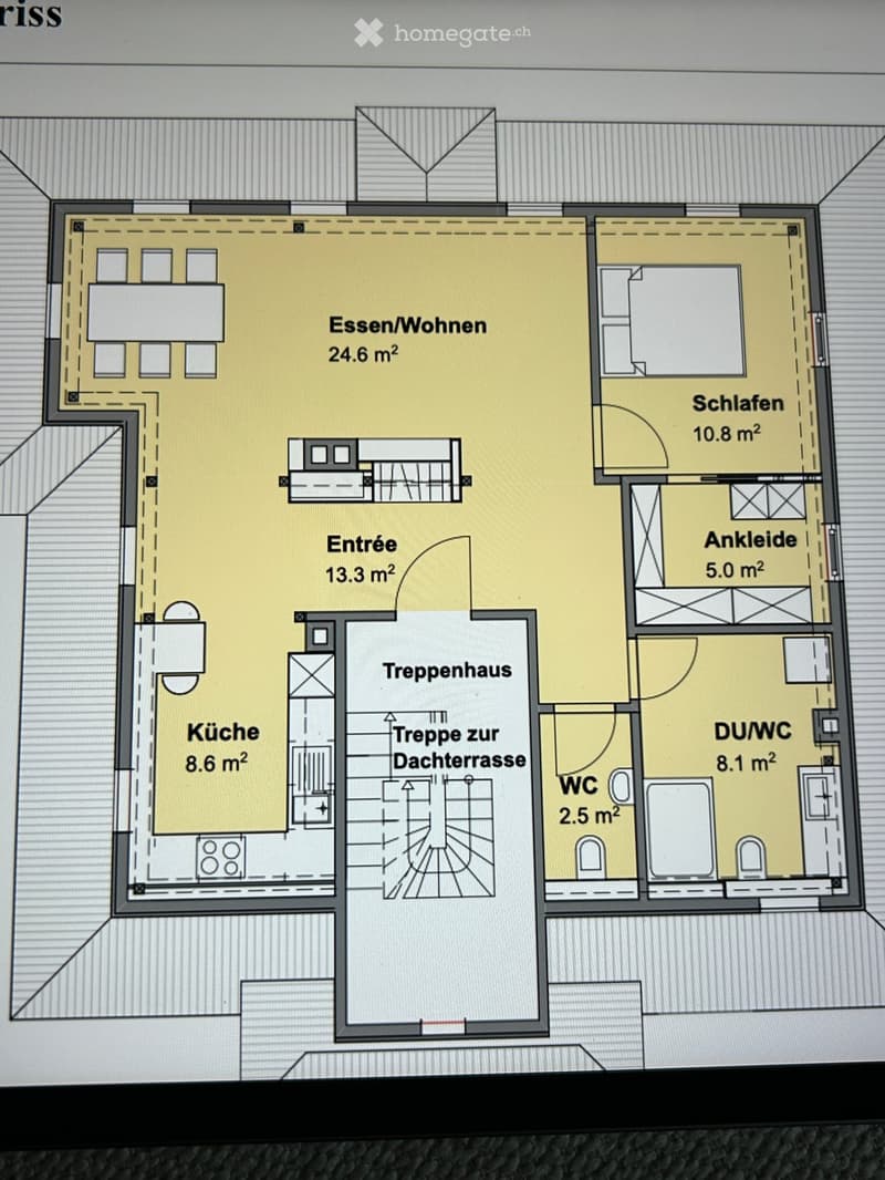 Floor plan showing a kitchen, living/dining area, bedroom, bathroom, hallway, and staircase to a rooftop terrace.