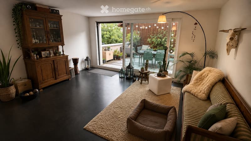 Modern living room with dark flooring, a large sofa, a dog bed, a wooden cabinet, and a balcony area with outdoor furniture.