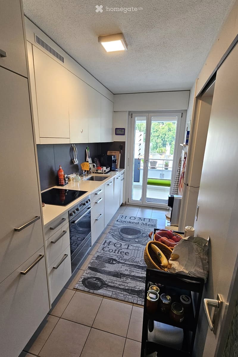 {"visible_features": ["Balcony / Terrace"], "type": "Kitchen", "objects": ["oven", "sink", "fridge", "cupboard", "oven", "faucet", "cutting board", "coffee maker", "oven", "oven", "oven", "oven", "oven", "oven", "oven", "oven", "oven", "oven", "oven", "ov