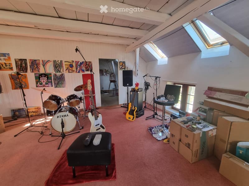 {"type": "Furnished Room", "objects": ["drum set", "guitar", "stool", "speaker", "stool chair", "microphone stand", "stool", "stool chair", "stool", "stool", "stool", "stool", "stool", "stool", "stool", "stool", "stool", "stool", "stool", "stool", "stool"