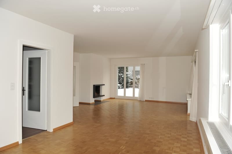 wood floor, fireplace, sliding windows, open door, bright and empty