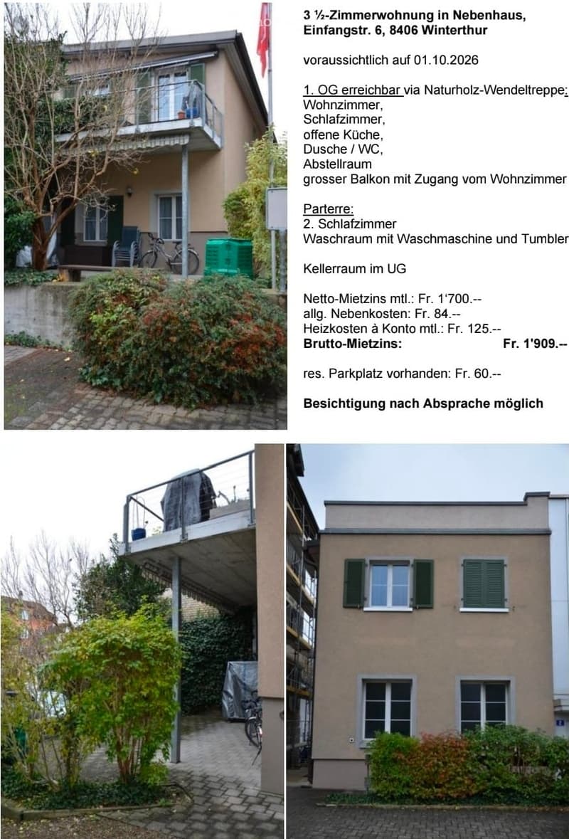 Two-story residential building with a balcony, bicycle, and surrounding greenery.