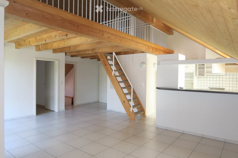 empty room, white tile flooring, wooden ceiling, wooden staircase