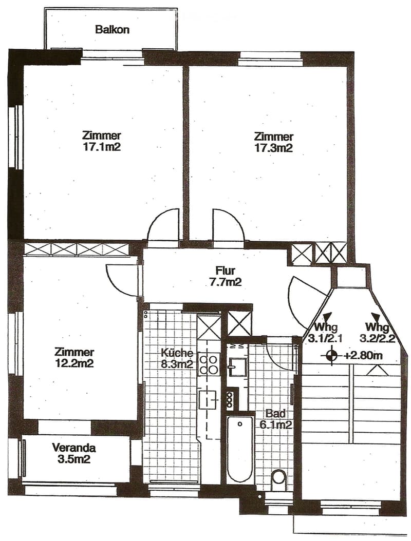 Floor plan showing a kitchen, two bedrooms, a bathroom, a hallway, a balcony, and a small veranda.