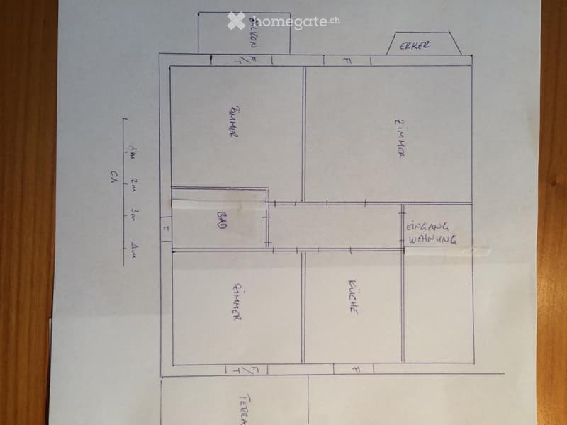 Floor plan showing a two-room apartment with a living room, bedroom, kitchen, and bathroom, along with an entrance area and balcony.