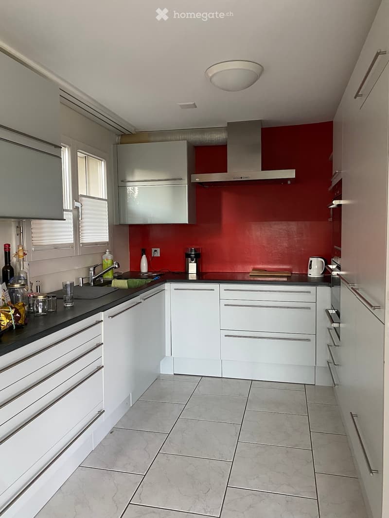 {"type": "Kitchen", "objects": ["sink", "faucet", "cabinets", "cupboards", "fridge", "oven", "hood", "bottle", "cup", "jar", "fridge", "cupboard", "bottle", "cup", "cupboard", "cupboard", "cupboard", "cupboard", "cupboard", "cupboard", "cupboard", "cupboa