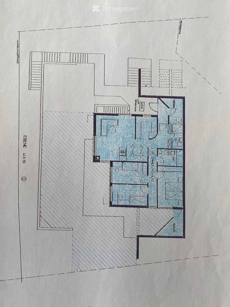Floor plan of a residential unit showing a living room, kitchen, two bedrooms, and two bathrooms.