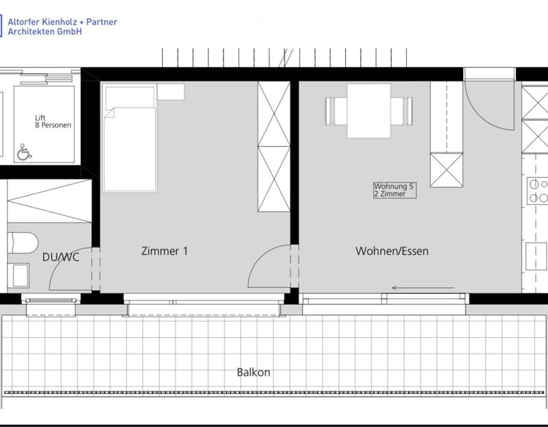 Floor plan showing a room layout with a living/dining area, bedroom, bathroom, and balcony access.