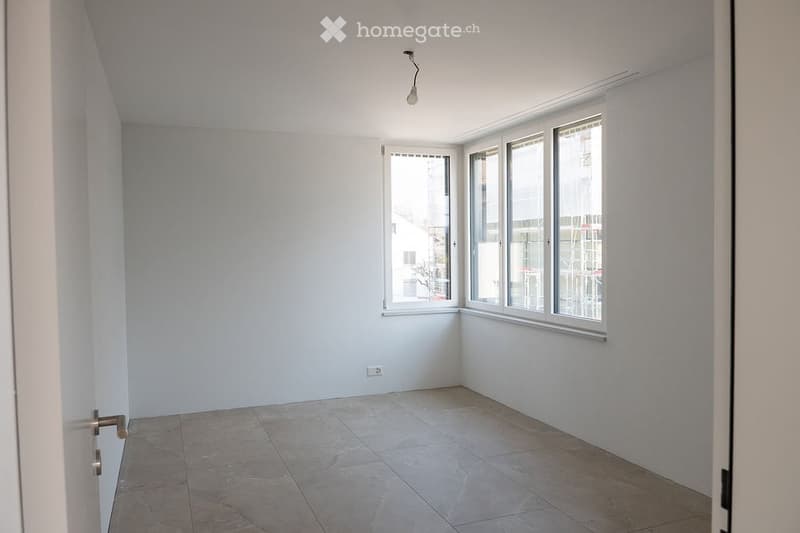 empty room, white walls, tiled floor, three windows, power outlet