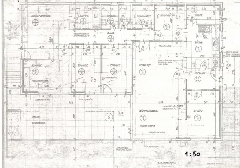 Floor plan showing multiple rooms including living room, kitchen, bedrooms, bathrooms, and a terrace.