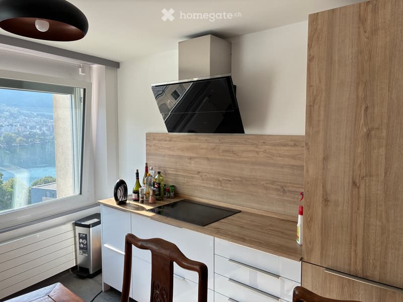 {"type": "Kitchen", "objects": ["stove", "fridge", "chair", "bottle", "cup", "bottle", "bottle", "bottle", "bottle", "bottle", "bottle", "bottle", "bottle", "bottle", "bottle", "bottle", "bottle", "bottle", "bottle", "bottle", "bottle", "bottle", "bottle"
