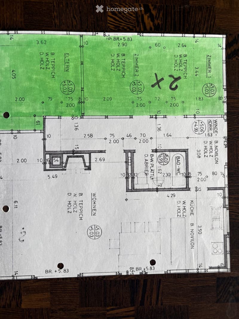 Floor plan of a residential space showing multiple rooms including a kitchen, living room, bedrooms, and bathrooms with labeled dimensions and room names.
