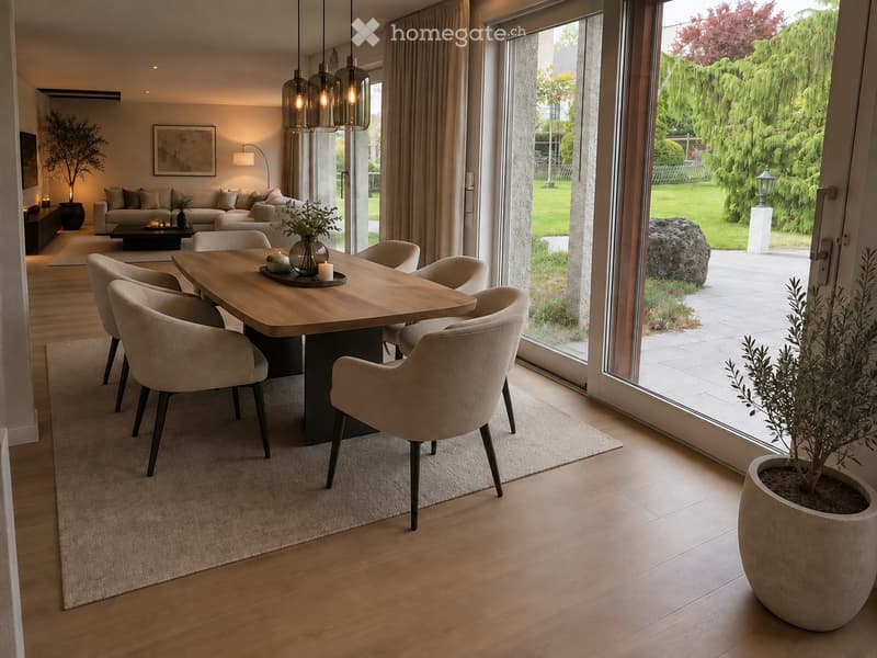 Modern dining and living area with a wooden dining table, beige chairs, a sofa, coffee table, pendant lights, and large windows overlooking a garden.