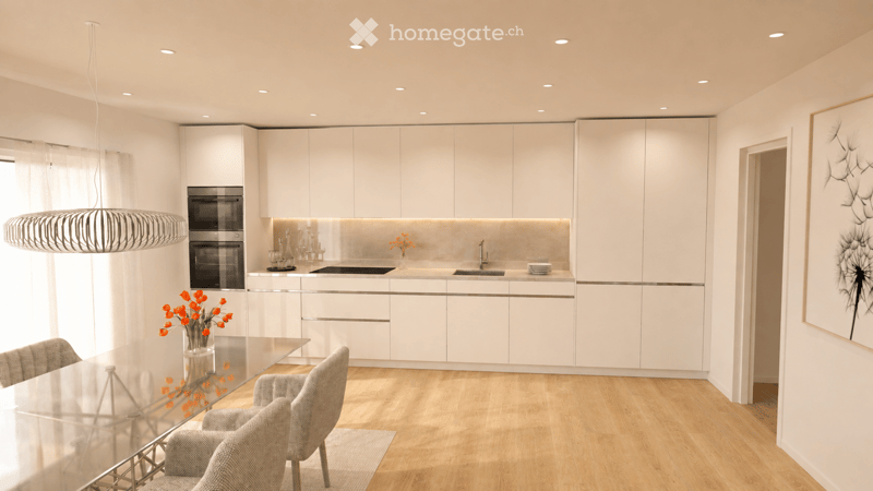 Modern kitchen with white cabinetry, stainless steel appliances, a central island, and a glass dining table with chairs.