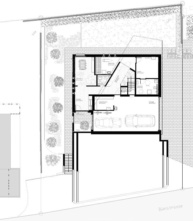 Floor plan of a house with a living room, dining room, kitchen, bedrooms, bathrooms, and a garage with parking spaces.
