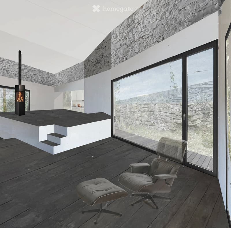 Modern living room with dark wooden flooring, a sleek black fireplace, two contemporary chairs, a small table, and a large glass wall offering a scenic view.