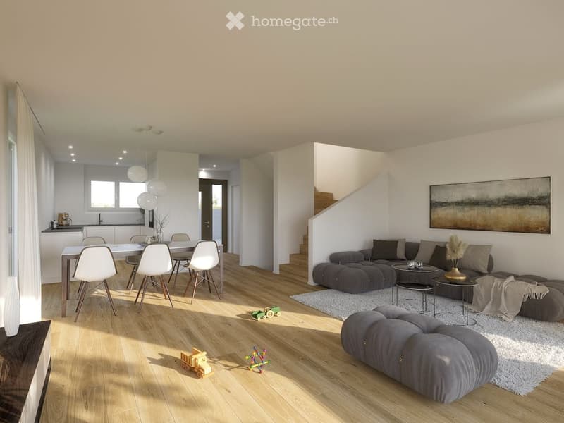 Modern living and dining area with a grey sectional sofa, ottoman, coffee table, dining table with chairs, and decorative items.