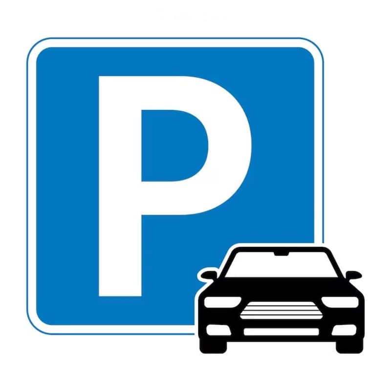 Parking sign with a car icon, indicating a parking area.
