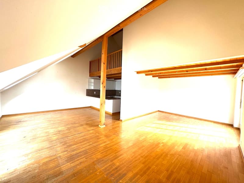 empty room, wooden floor, white walls, wooden beams, balcony