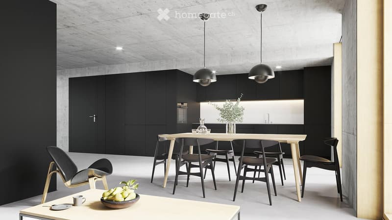 The image shows a modern, minimalist kitchen and dining room. The kitchen features black cabinets and a large window, while the dining area has a wooden table with black chairs. The room has a concrete ceiling with recessed lighting, and there is a dishwa
