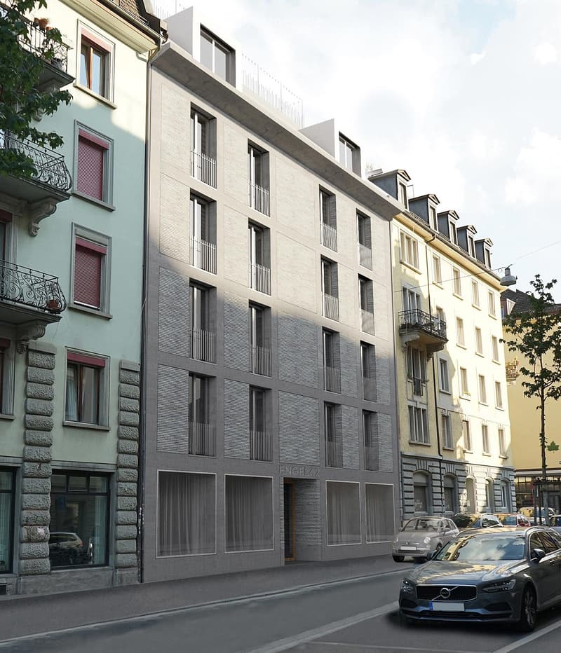 Multi-story residential building with a mix of modern and traditional architectural styles, featuring balconies, windows, and parking spaces on the street level.