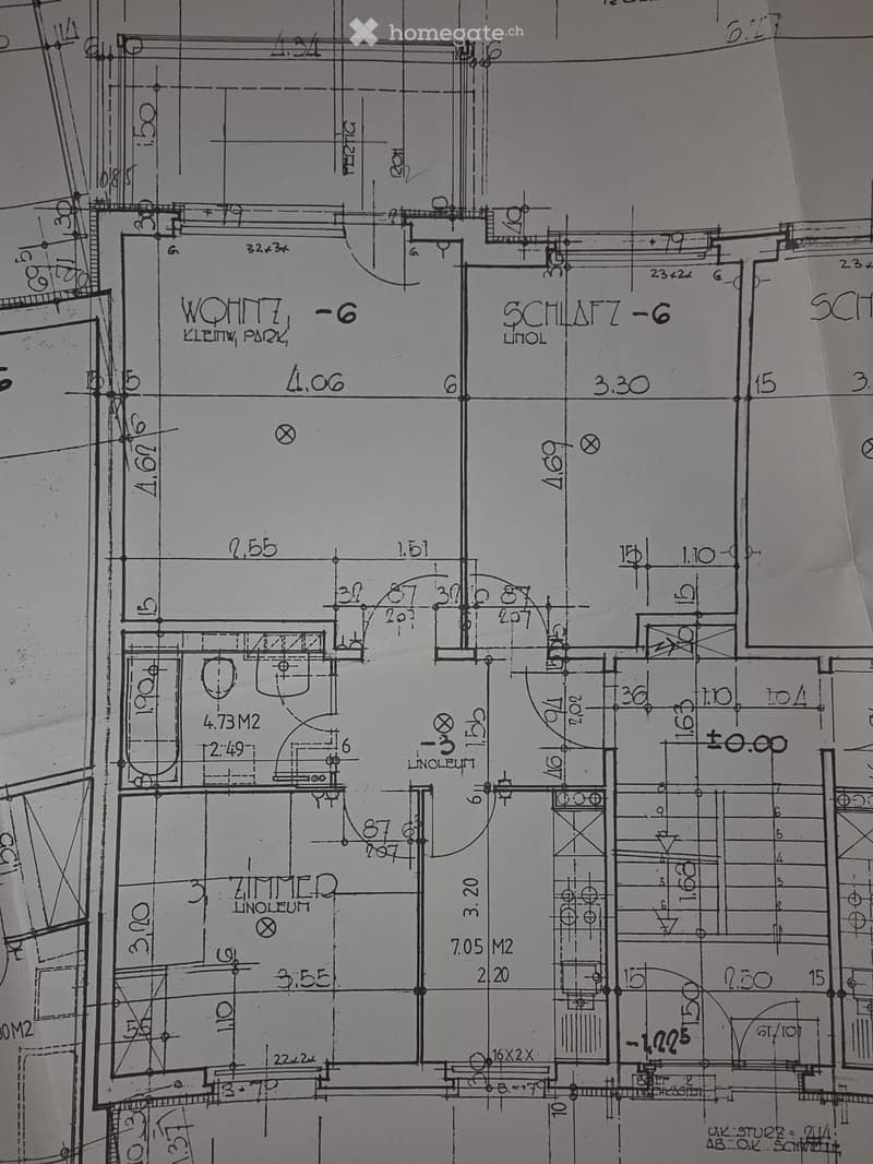 Floor plan showing a layout with labeled rooms including a living area, bedroom, and kitchen, with dimensions and measurements indicated.