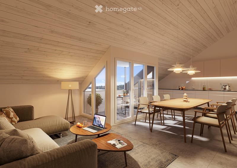 Modern living and dining area with a sofa, coffee table, laptop, dining table, chairs, floor lamp, and a small kitchen area with cabinets and a counter.