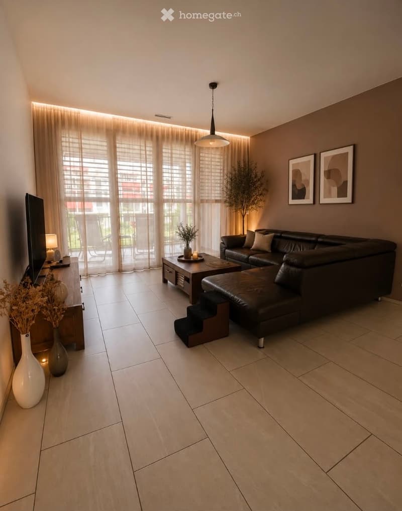 Modern living room with large windows, a black leather sectional sofa, coffee table, ottoman, and decorative vases. There is a balcony visible through the windows.