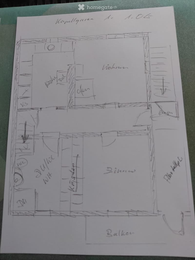 Hand-drawn floor plan showing a living room, kitchen, bedroom, bathroom, and balcony.