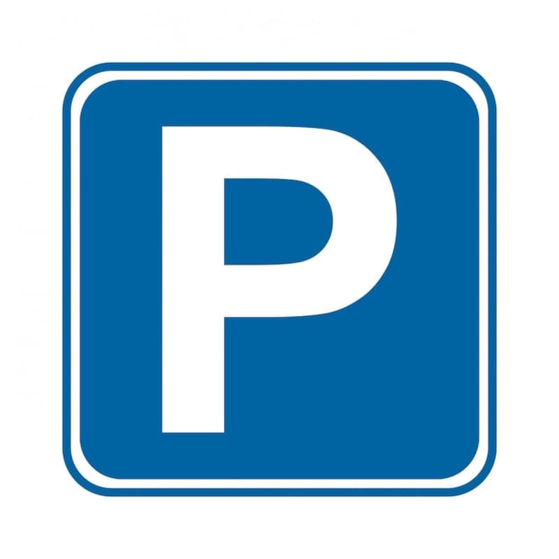 A blue square icon with a white letter "P" in the center, representing a parking symbol.