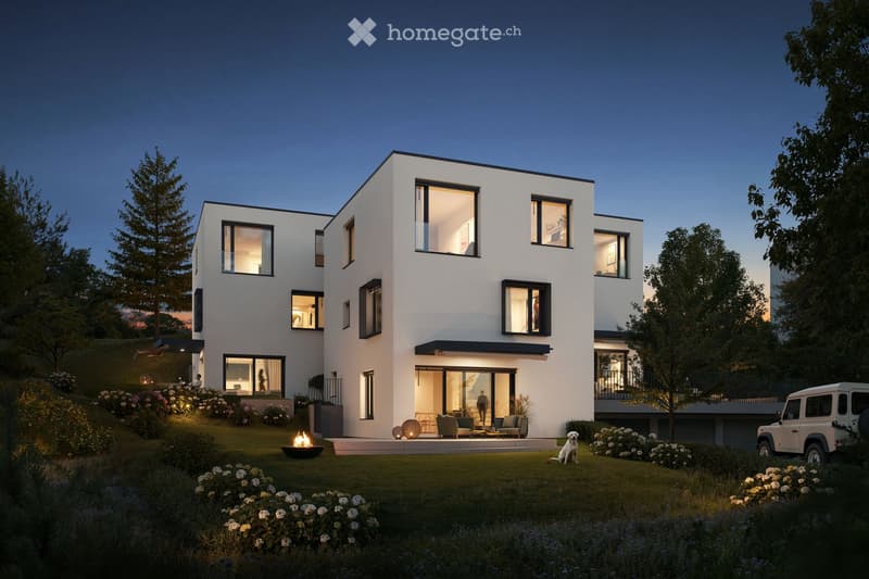 Modern two-story house with white exterior, large windows, balcony, garden, and fire pit.