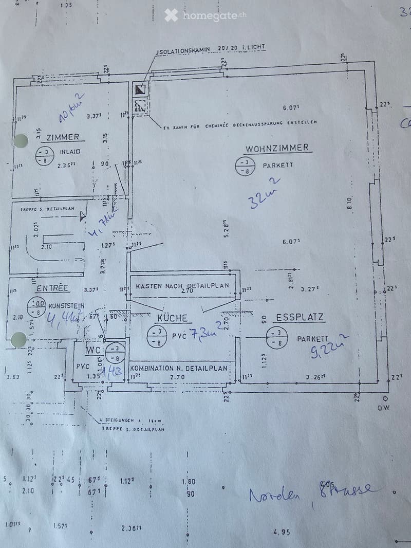 Floor plan showing a layout with labeled rooms including a living room, kitchen, dining area, bedroom, and entrance.